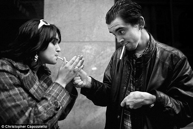 nick lit a cigarette for a lady